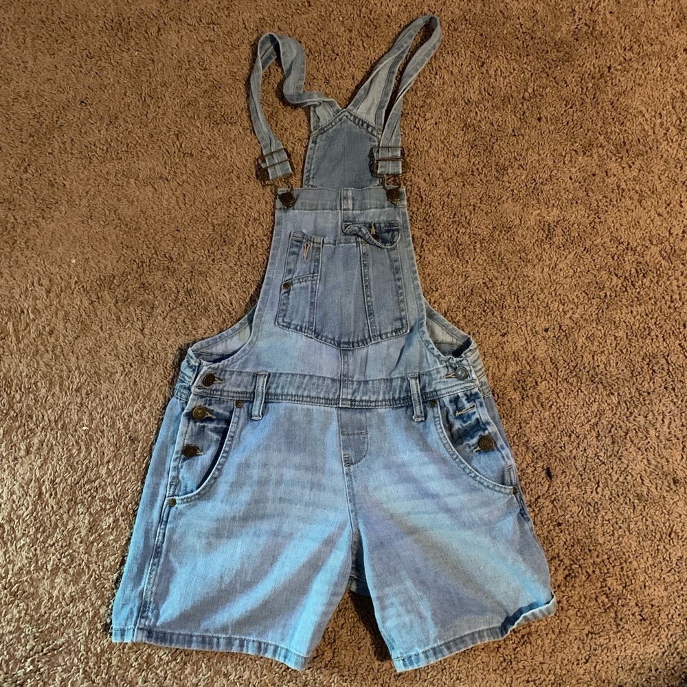 light blue denim overalls